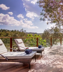 Outside seating | sun beds | with views of the river and pool | algarve, portugal